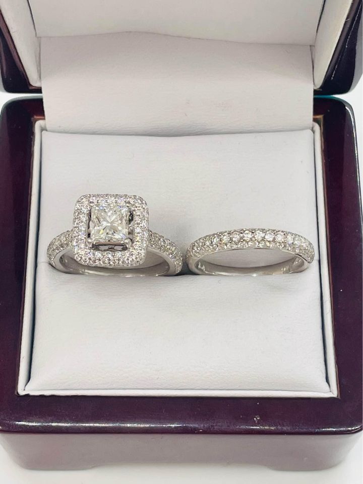 Platinum ring sets with 1.02 centre princess cut Mondavhie Man-made Diamond in D color , VVS1 , Excellent-cut & 1.03 accented diamonds  Matching band sets with 0.62 CTW of natural diamonds.