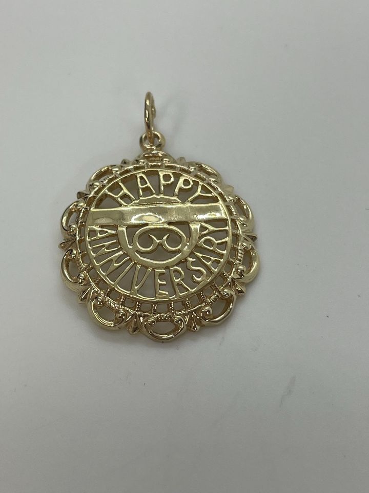 Special Happy Anniversary 10kt yellow gold pendant